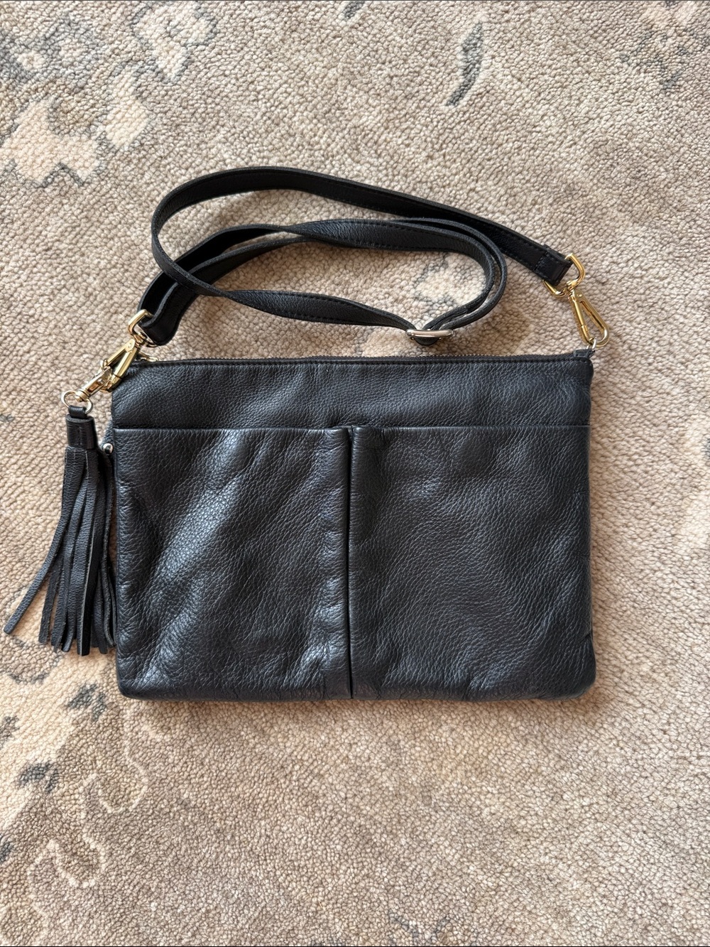 Roots Convertible Black Leather Crossbody with Tassel Accent